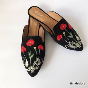 Black floral loafers